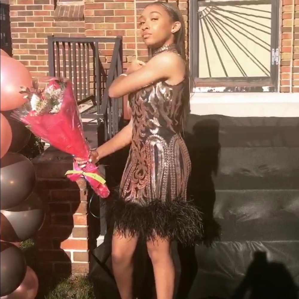 Sequence dress with ostrich feather trim